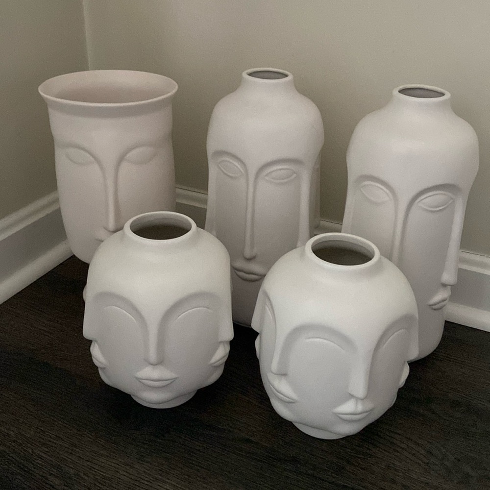 Ceramic face vases